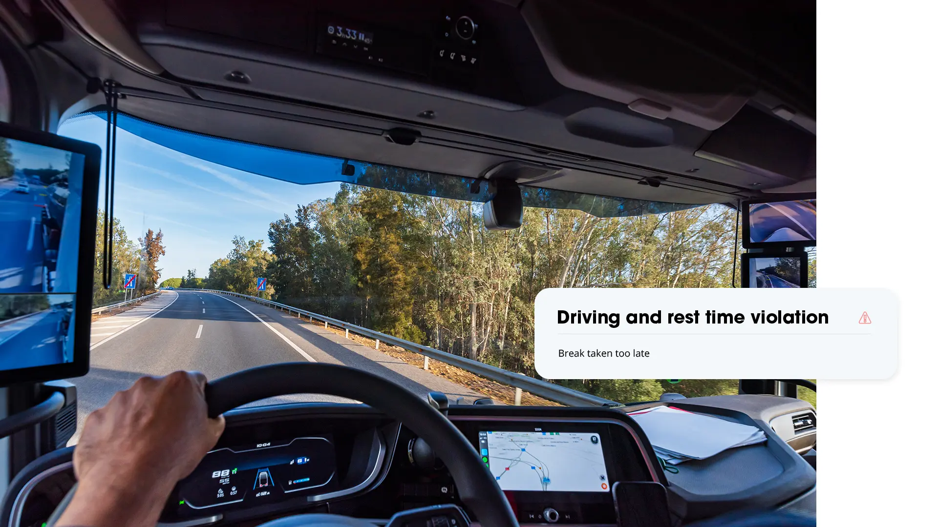 View from inside a moving truck on a tree-lined road, with a GPS-Buddy alert about a driving and rest time violation: break taken too late