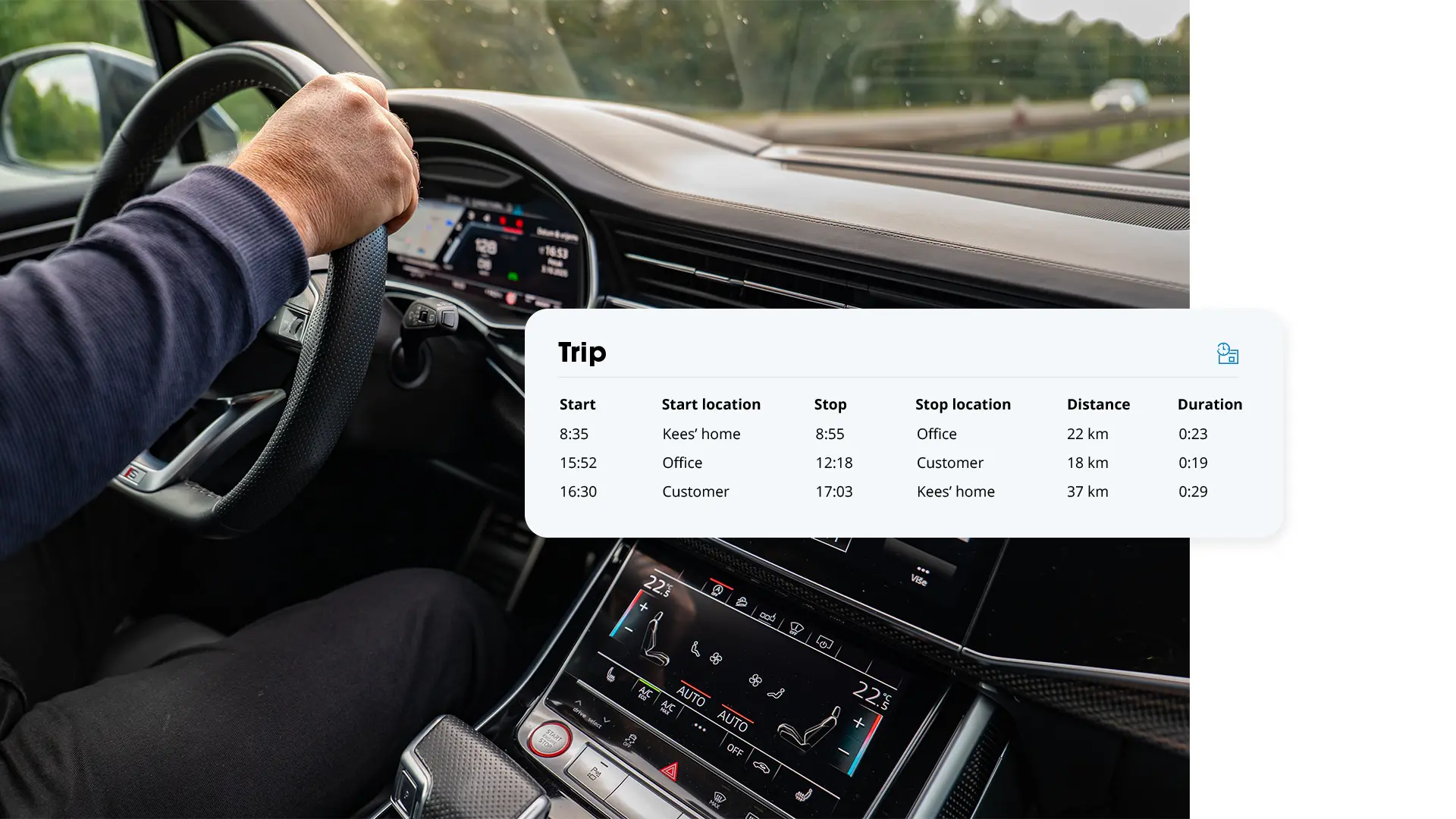 Hand on a car steering wheel with an overlay showing a trip overview listing start and stop locations, distance and duration per trip.